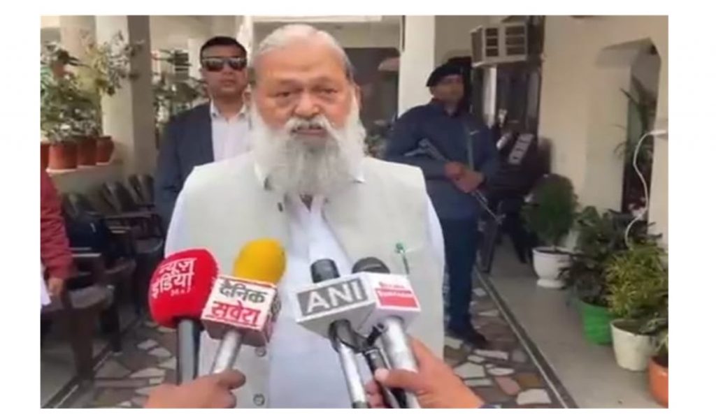 Anil Vij speaking to reporters