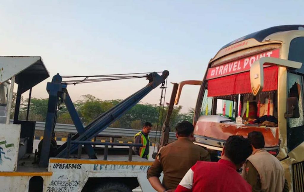 Double-decker bus hits car