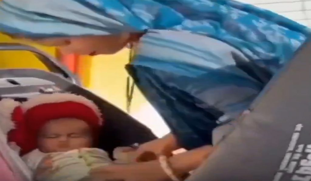 Child in scooter's trunk