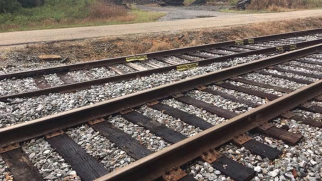 Van Collides with Freight Train